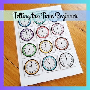 May include: A worksheet with the title "Telling the Time Beginner" and nine colorful analog clocks with different times. Each clock has black numbers and hands.