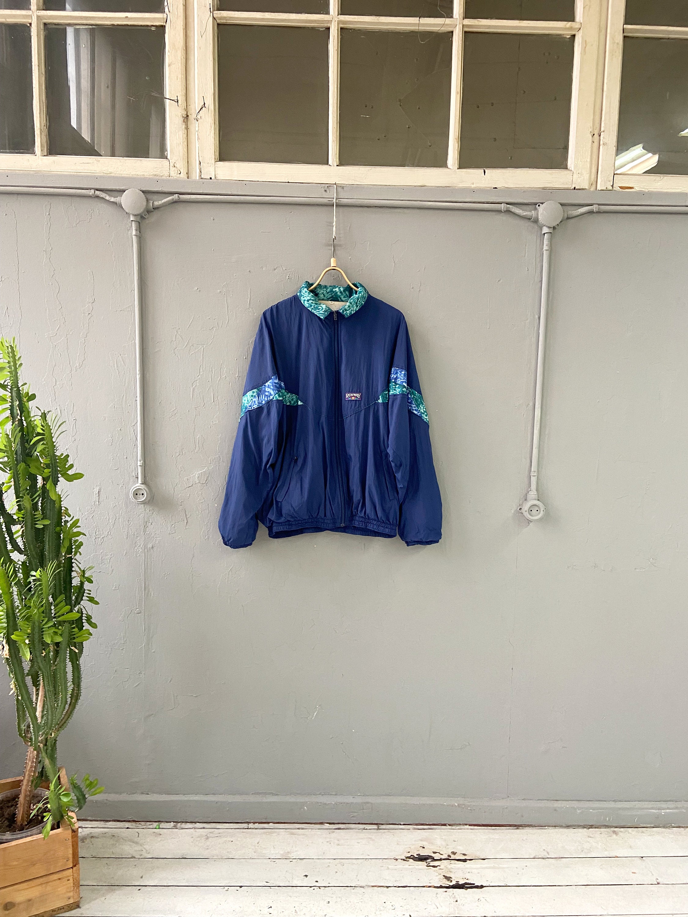 Aqua blue hotsell windbreaker