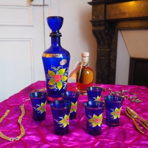 Vintage blue and gold decanter and glasses