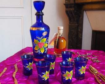 Vintage blue and gold decanter and glasses