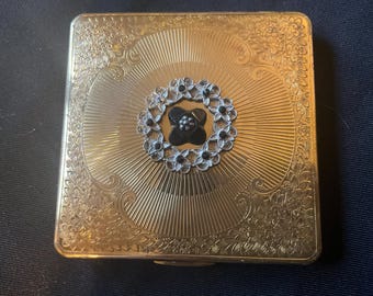 Polvos compactos Kigu chapados en oro de los años 50: glamour vintage