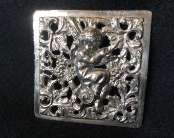 Hebilla de cinturón Cupido o putti de metal blanco fundido vintage muy bonita