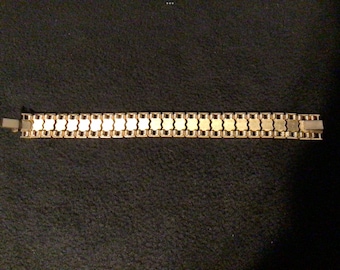 Pulsera original de calidad en tono dorado pesado de los años 60.