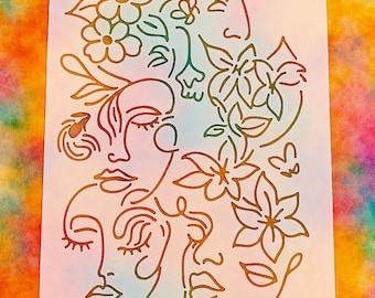 May include: A rectangular sticker featuring line art of several faces and floral elements. The design is in shades of brown, green, and red, set against a white background. The background is a colorful watercolor wash.