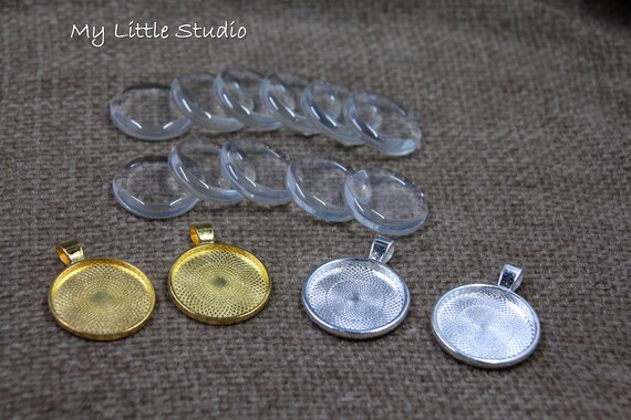 Set van 50 glazen cabochon lunette hangers, trays voor het maken van sieraden, koepel, cabochon, kristal, rond, cabochon, blanco's, doe-het-zelf sieraden, 25 mm, zilver Set van 50 glazen cabochon lunette hangers, trays voor het maken van sieraden, koepel, cabochon, kristal, rond, cabochon, blanco's, doe-het-zelf sieraden, 25 mm, zilver