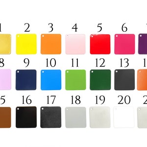 May include: A chart of 21 color swatches, numbered 1 through 21. The swatches are arranged in three rows of seven. The colors include gold, yellow, orange, pink, red, magenta, purple, light pink, navy blue, light blue, green, dark green, gray, orange, brown, black, dark gray, light gray, silver, and white.