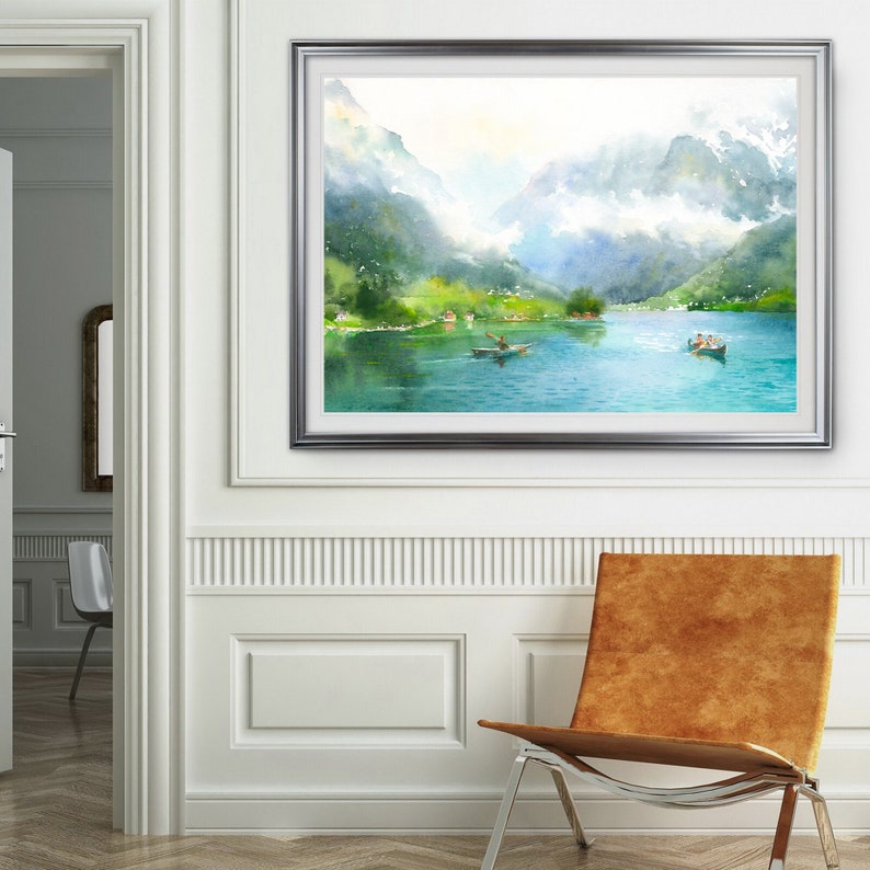 May include: A watercolor painting of a lake surrounded by mountains. The lake is a light blue color and the mountains are a dark green color. There are two boats on the lake with people in them.