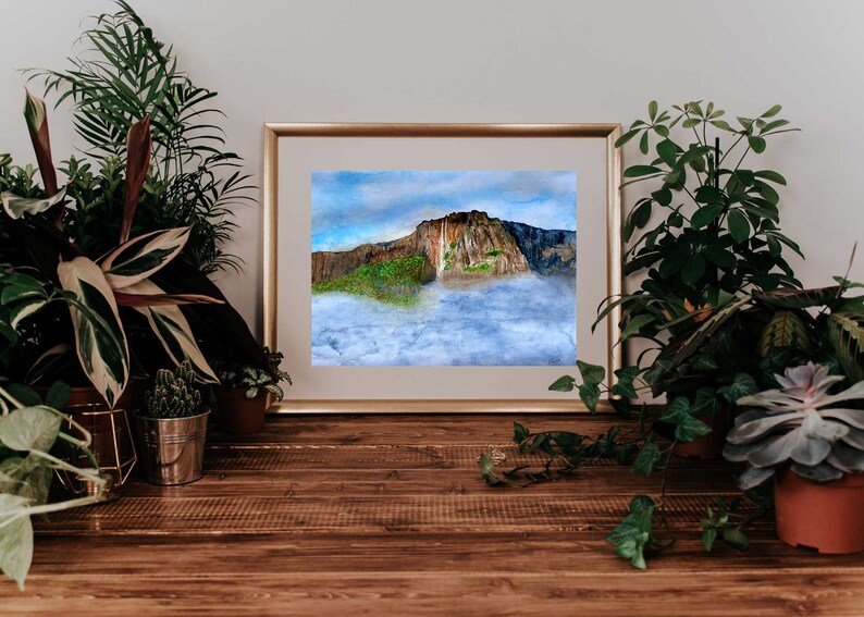 May include: A watercolor painting of a mountain peak with a waterfall cascading down the side. The mountain is surrounded by clouds and a blue sky.