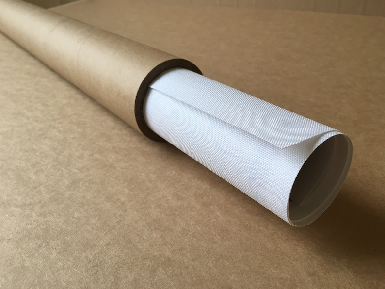 May include: A white canvas print rolled up and stored in a brown cardboard tube.