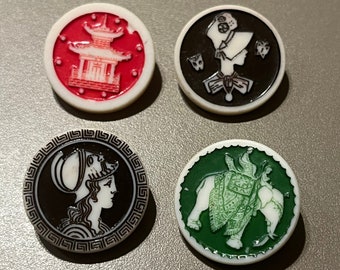 Vintage set of four Artid buttons