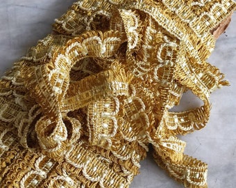 Vintage old gold silk furnishing trim