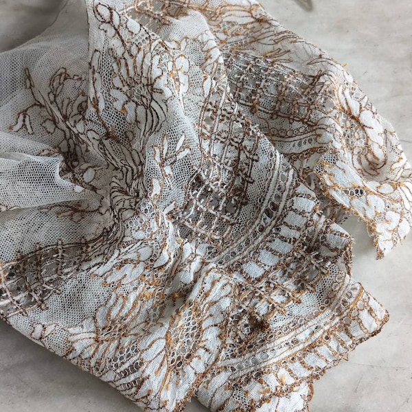Edwardian brown and white lace flounce.