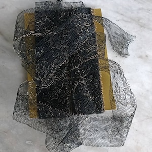 Antique black and gold silk lace trim