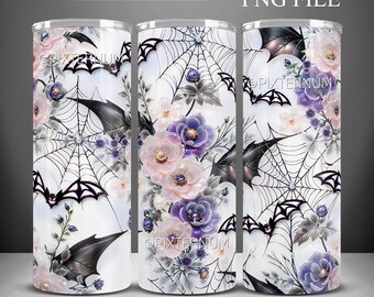 May include: A white tumbler featuring a design of bats, spiderwebs, and flowers in shades of purple and pink. The tumbler is decorated with a white background and a subtle shimmer.