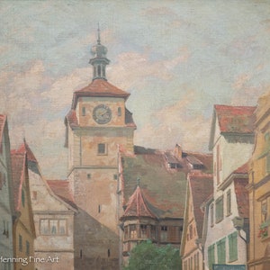 May include: A painting depicting a European town square with a tall clock tower in the center. The tower is a light brown color with a dark brown roof and a clock face on the front. The buildings surrounding the tower are also light brown with red tile roofs. The sky is a light blue with white clouds.