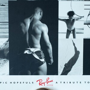 May include: Monochrome poster with images of athletes, including a weightlifter, swimmer, and gymnast. The poster includes the Ray-Ban logo and the text "OUR U.S. OLYMPIC HOPEFULS" and "A TRIBUTE TO EXCELLENCE."