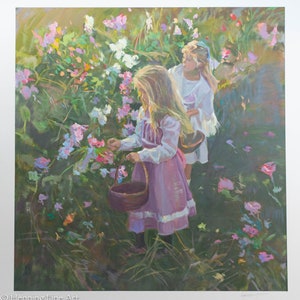 May include: Two girls in floral dresses pick flowers in a field of purple, pink, and white blossoms. The girl in the front is holding a brown basket.