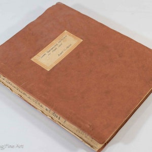 May include: A brown leather-bound book with a label that reads "Lessons in Bookkeeping and Accounts for Public Schools" and "Davis C. Ellis".