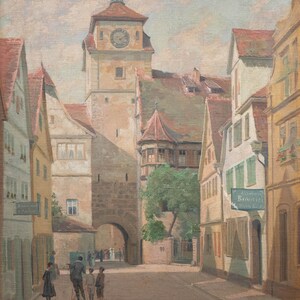 May include: A painting of a street scene in a European town. The street is lined with buildings, including a tall tower with a clock face. There are people walking in the street, and a sign for a restaurant or tavern is visible on one of the buildings. The painting is done in a realistic style, with muted colors and a sense of depth.