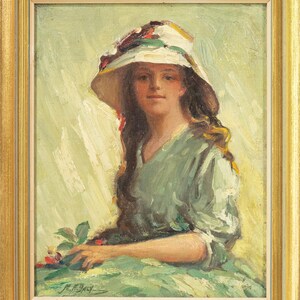 May include: Oil painting of a woman wearing a wide-brimmed hat with floral accents and a green dress. The artwork is framed in a gold-colored wooden frame. The artist's signature is visible in the lower left corner.