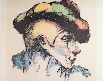 May include: An artistic print of a person's profile, featuring a colorful hat with yellow, green, and red accents. The face has soft pink and blue hues, with a dark outline. The artwork is signed and numbered.