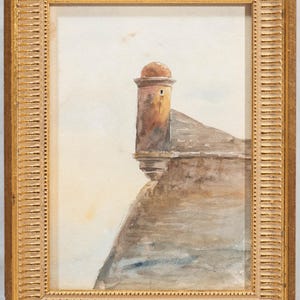 May include: Watercolor painting of a fortress tower with a domed roof, set within a gold ornate frame. The artwork features muted tones of brown, beige, and blue, depicting architectural details. The frame has a detailed, textured design.