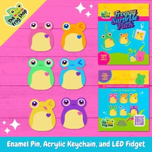 May include: A collection of colorful frog-shaped enamel pins, acrylic keychains, and LED fidgets. The pins and keychains are in various colors, including pink, orange, green, blue, yellow, and purple. The packaging includes the text "Froggy Surprise Pack."