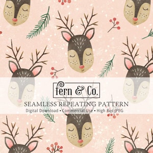 May include: A seamless repeating pattern featuring watercolour illustrations of reindeer with closed eyes on a light pink background. The pattern also includes small sprigs of green pine and red berries.