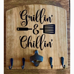 Grillin and ChillIn sign with hooks and bottle opener