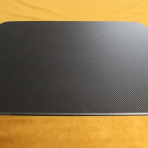 Carbon coffee table panel