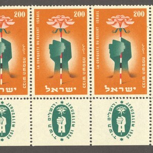 May include: A sheet of postage stamps featuring a stylized design. The stamps have an orange background with a green hand holding a flower. Text includes "LA CONQUETE DU DESERT ISRAEL" and the number "200".