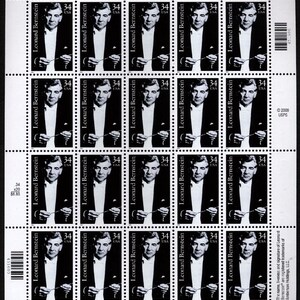 May include: A sheet of 20 US postage stamps featuring a black and white portrait of Leonard Bernstein, a conductor and composer, holding a baton. The stamps are arranged in a 4x5 grid and have the text "Leonard Bernstein" and "34 USA" printed on them.