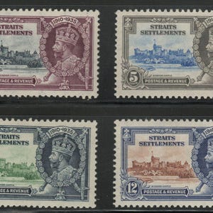 May include: Four vintage Straits Settlements postage stamps. Each stamp features a portrait of a crowned figure and a depiction of a castle. The stamps are in shades of purple, blue, green, and brown, with text indicating the value and "POSTAGE & REVENUE."