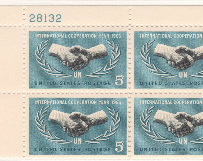 1965 International Cooperation Year Plate Block of Four 5-Cent US Postage Stamps Mint Never Hinged