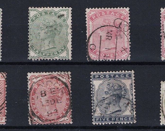 Queen Victoria Eight Postage Stamps from Great Britain 1880s