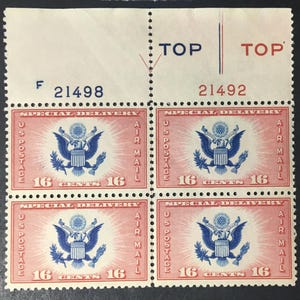 May include: A sheet of four vintage US postage stamps. Each stamp features a blue eagle emblem on a red and white background, with the text "SPECIAL DELIVERY", "AIR MAIL", and "16 CENTS". The word "TOP" is printed at the top.