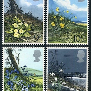 May include: A sheet of four postage stamps featuring spring flowers. The stamps depict primroses, daffodils, bluebells, and snowdrops, with values of 9p, 10½p, 11p, and 13p. Each stamp has a silhouette of a person in the upper right corner.