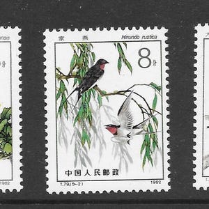 May include: A collection of five postage stamps featuring colorful bird illustrations. Each stamp displays a different bird species perched on branches with flowers. The stamps have values of 8, 20, and 70, with Chinese text.