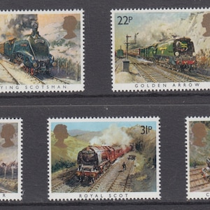 May include: A set of five vintage postage stamps featuring illustrations of British steam locomotives. The stamps are in mint condition and feature the names of the locomotives: "Flying Scotsman", "Golden Arrow", "Cheltenham Flyer", "Royal Scot", and "Cornish Riviera".