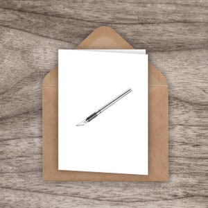 May include: A black and white illustration of a utility knife on a white card.