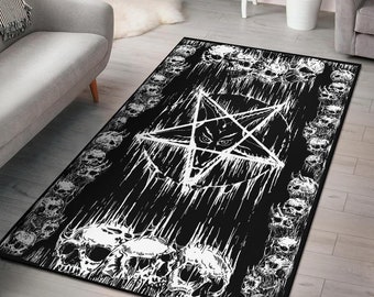 May include: Black and white rug with a pentagram and skulls. The pentagram has a face in the center. The skulls are arranged in a border around the pentagram.