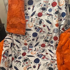 Space Cadet Minky Cuddle Paired with Luxe Minky Orange - Toddler/Kids blanket. Available for immediate shipping.