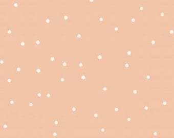 Geometric dots: small white dots on a light peach orange background + choice of cotton, sweatshirt fabric, jersey, muslin