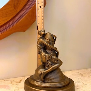 Woman Hugging Penis Statue Female Embracing Penis Phallus Sculpture woman-hugging-penis-statue-female-embracing-penis-phallus-sculpture