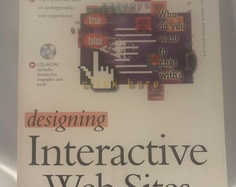 May include: A book titled "Designing Interactive Web Sites" with a white cover. The cover features a collage of text and graphics, including the words "true," "false," and "click here." A CD-ROM icon is also visible.