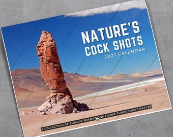 May include: A 2027 wall calendar titled Nature's Cock Shots featuring a large, vertical, reddish-brown rock formation in a desert landscape under a bright blue sky. The bottom text reads A COLLECTION OF PHALLIC FORMATIONS FOUND THROUGHOUT NATURE.