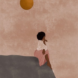 May include: A woman with dark brown hair sits on a rock, looking out at a large, golden sun in a light brown sky. She is wearing a white blouse with floral embroidery and a pink pleated skirt.