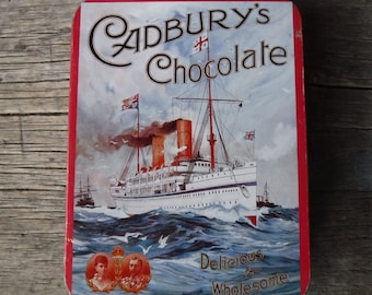 Lata de chocolate rara da Cadbury com a realeza do Rei George e da Rainha Mary