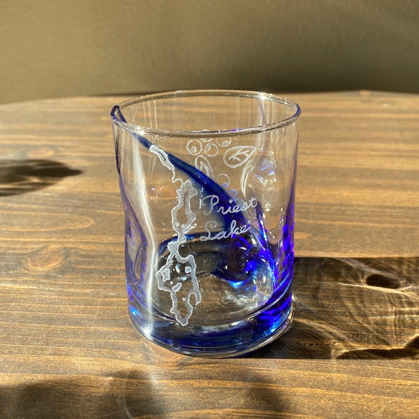 Hand Engraved 12.5oz Double Old Fashioned Glass w/ Blue Strip. Priest Lake on Front & Huckleberries on Back. Indented Glass for Easy Holding