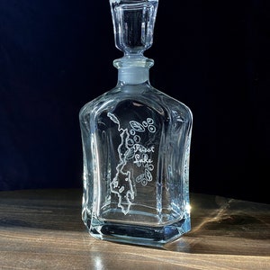 Hand Engraved Glass Decanter with Priest Lake on the Front and Huckleberries on the Back